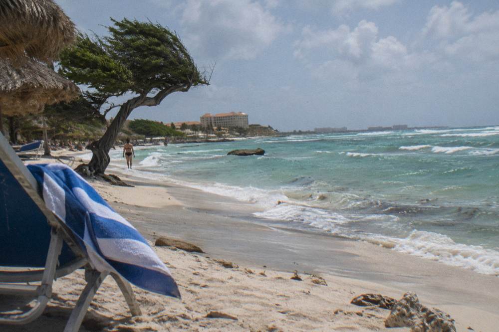 Whitecaps forming on turquoise Caribbean water as wind crosses the coast of Aruba